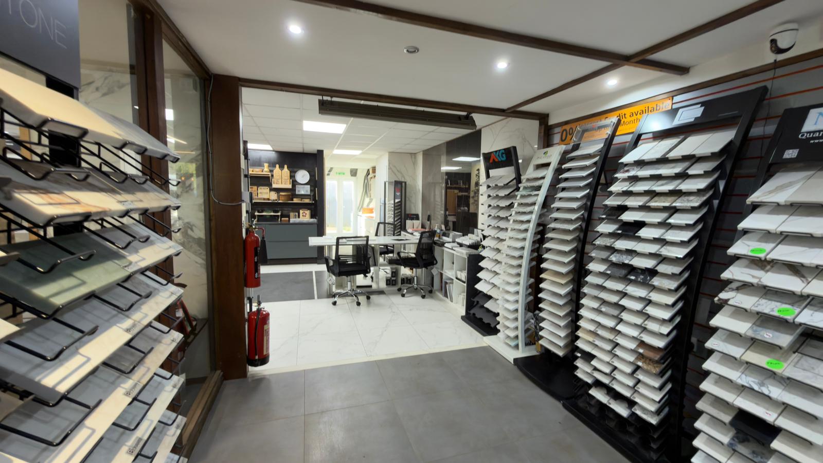 Precious Marble showroom featuring a stunning marble kitchen island